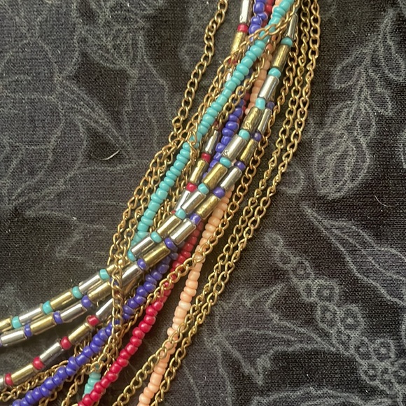 3 pieces of golden costume jewelry: 2 pairs of earrings + a bead/chain necklace. - Picture 10 of 12